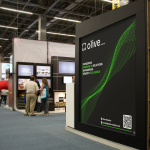 square-banner-mockup-in-a-convention-center-a10779